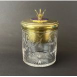 A Russian silver and gilt etched glass jar with enamelled decoration to top, H. 13.5cm.