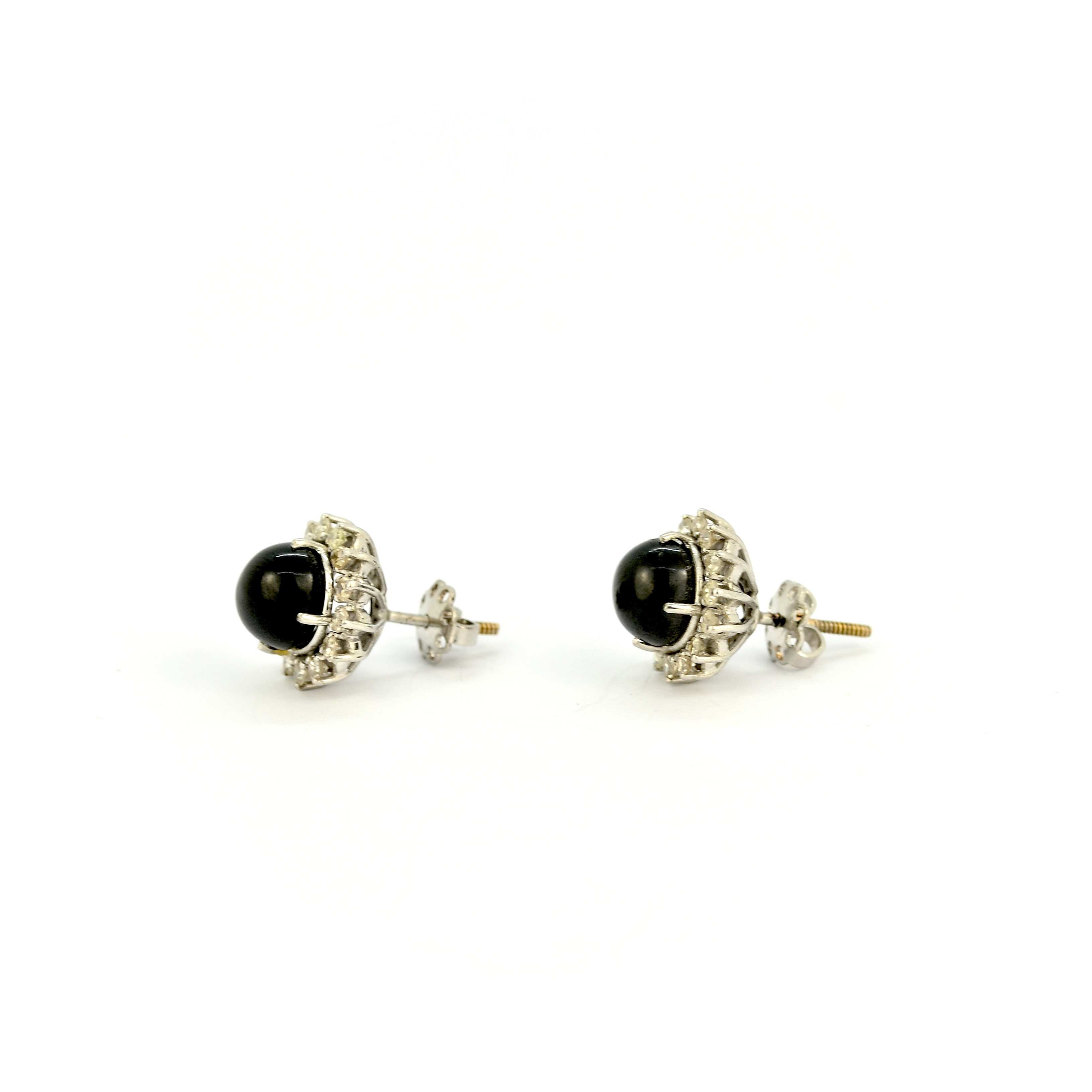 A pair of 18ct white gold cluster stud earrings each set with a cabochon star sapphire - Image 2 of 3