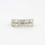A 9ct white gold double row half eternity ring set with brilliant cut diamonds, estimated approx.