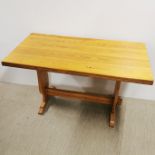 A pine kitchen table, 122 x 73 x 60cm.
