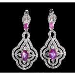 A pair of 925 silver drop earrings set with cabochon cut rubies and white stones, L. 3.6cm.