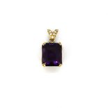 A yellow metal (tested high carat gold, minimum 18ct) pendant set with a large emerald cut