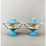 A pair of continental porcelain bowls and covers. H. 20 cm.