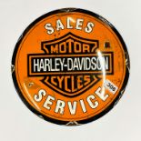 A Harley-Davidson enamelled iron advertising sign, Dia. 30cm.