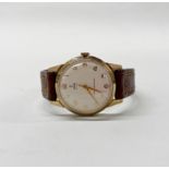 A 9ct gold gent's Tudor wristwatch. In working order. Watch W 3.3cm.