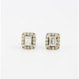 A pair of 18ct white gold stud earrings set with baguette and brilliant cut diamonds, approx. 0.5ct,
