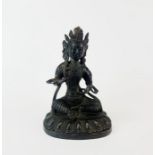 A Tibetan bronze figure of a seated Tara, H. 20cm.