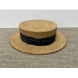 A vintage straw boater by Chamberlain of Boston.