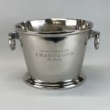 A polished meta champagne bucket, W. 39 cm. H. 25cm.