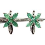 A pair of 925 silver flower shaped earrings set with marquise cut emeralds and white stones, L. 1.