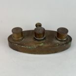 An antique brass oil burner by Down Bros of London, W. 21cm.