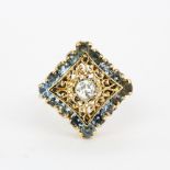 A large 18ct yellow gold ring set with a diamond, estimated approx. 0.33ct, surrounded by round