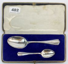A boxed 1926 hallmarked silver christening set, engraved.