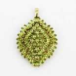 A large 925 silver gilt pendant set with marquise cut peridot, L. 5.5cm.