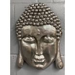 A large silvered wall mounted composition Buddha head, H. 59cm.