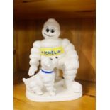A cast iron Michelin man figure, H. 20cm.