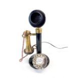 An early stick telephone.