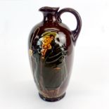 A Royal Doulton series ware Dewar's whiskey jugs, H. 20cm.