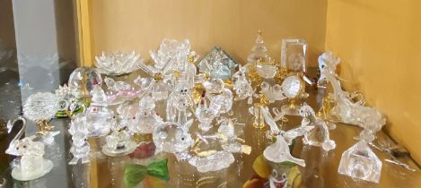 A collection of Swarovski and other crystal items.