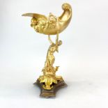 A gilt bronze Art Nouveau style centrepiece of a young woman holding a shell, H. 40cm. Note: some