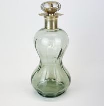 A hallmarked silver topped decanter, H. 23cm.