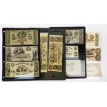 A group of early American bank notes.