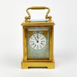 A miniature gilt brass carriage clock, H. 7.5cm.