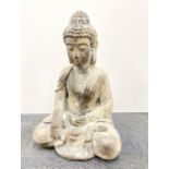 A large stone effect composition figure of a seated Buddha, H. 55cm.