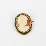 A large gilt/white metal cameo and turquoise set brooch/pendant, L. 4.5cm.