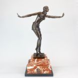 A large Art Deco style bronze figure of a female dancer after Chiparus on a marble base, H. 48cm.