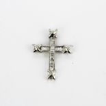 An 18ct white gold cross pendant with channel set baguette cut diamonds, 2.5 x 2cm.