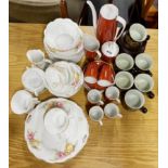 A stylish 1970's porcelain coffee set, A/F to coffee pot with 1970's stoneware coffee set and an