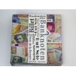 An album of mixed bank notes.