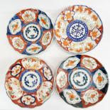 Four Japanese Imari porcelain plates, Dia. 22cm.