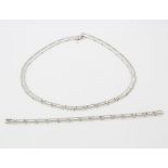 A Superoro 18ct white gold and diamond set necklace, clasp to longest L. 19cm, with a matching