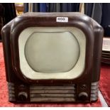 A bakelite Bush television, 40 x 40cm.