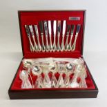 A cased silver plated Oneida cutlery set.
