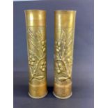 A pair of hand decorated WW1 trench art shell cases, H. 35cm.