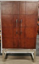 An interesting tan leather covered and chrome, five compartment bar cabinet, 162 x 93 x 41cm.