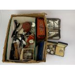 A box containing various vintage watches, pen knives, etc.