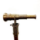 A walking stick with compass and telescope handle, L. 99cm.