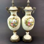 A pair of 19th century bronze mounted porcelain garnitures, H. 34cm.