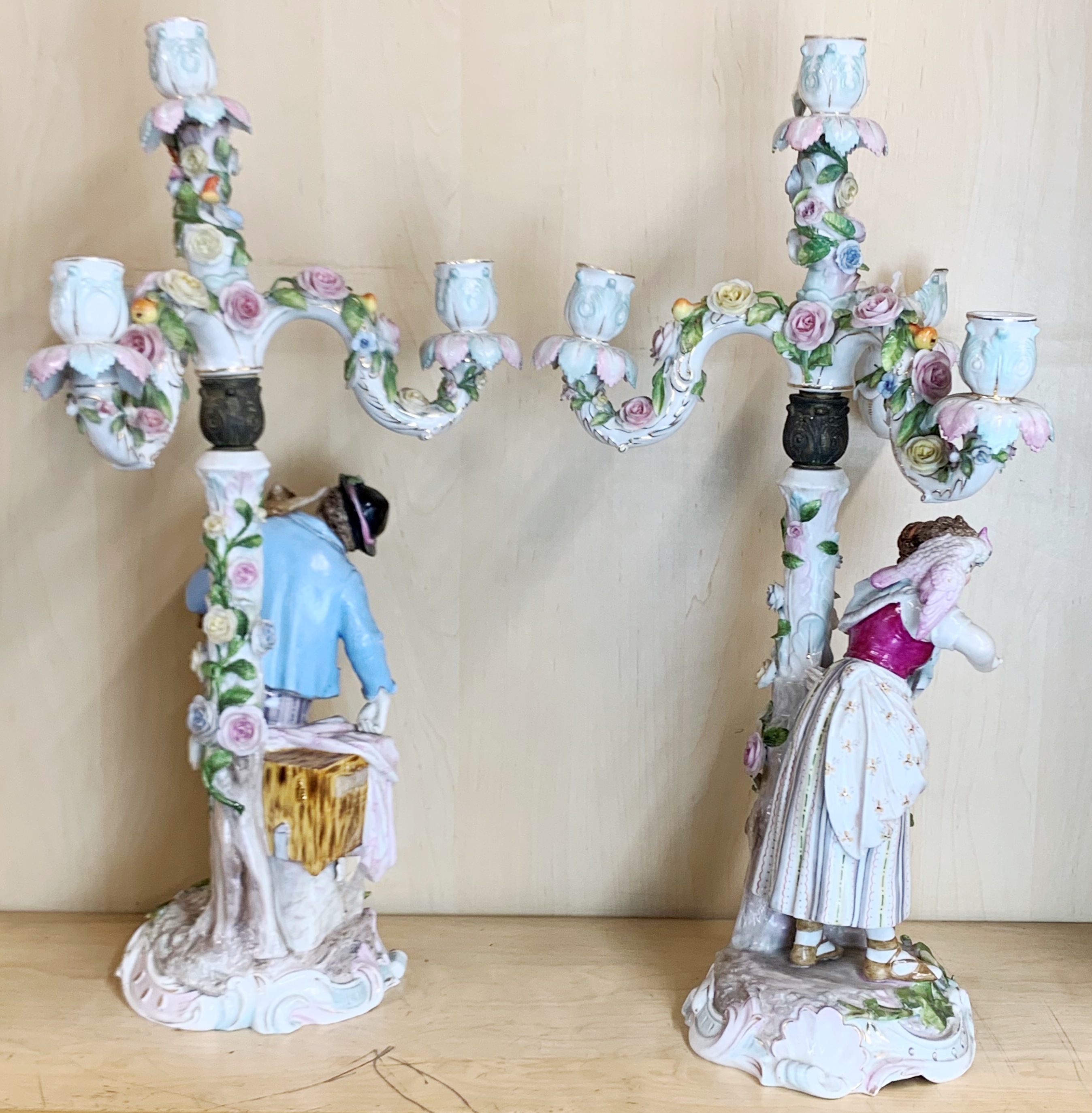 A pair of large 19th century hand-painted porcelain candelabras, H. 52cm. some damage, part of the - Image 5 of 5