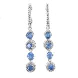 A pair of 925 silver drop earrings set with oval cut sapphires and white stones, L. 4.4cm.