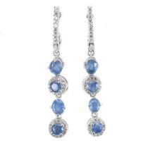 A pair of 925 silver drop earrings set with oval cut sapphires and white stones, L. 4.4cm.