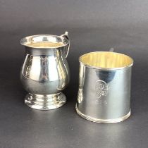 Two hallmarked silver christening tankards one engraved for 1914, H. 8cm.