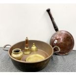 A large copper pan with copper bed warmer and three brass items, pan dia. 44cm.
