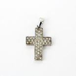 A 9ct white gold diamond set cross pendant, L. 3.8cm.