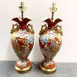 A pair of 19th century Japanese porcelain vases mounted c. 1920 as lamp bases, H. 60cm.