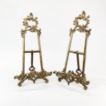 A pair of brass easels, H. 38cm.